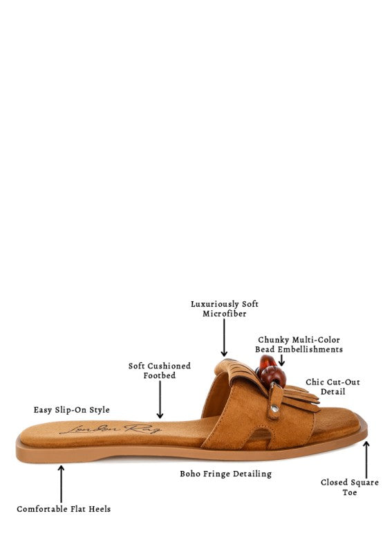 Tan microfiber beaded slip-on flat sandals with boho fringe and closed square toe