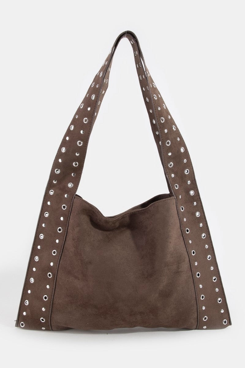 Suede grommet strap shoulder bag in dark brown with silver eyelet trim