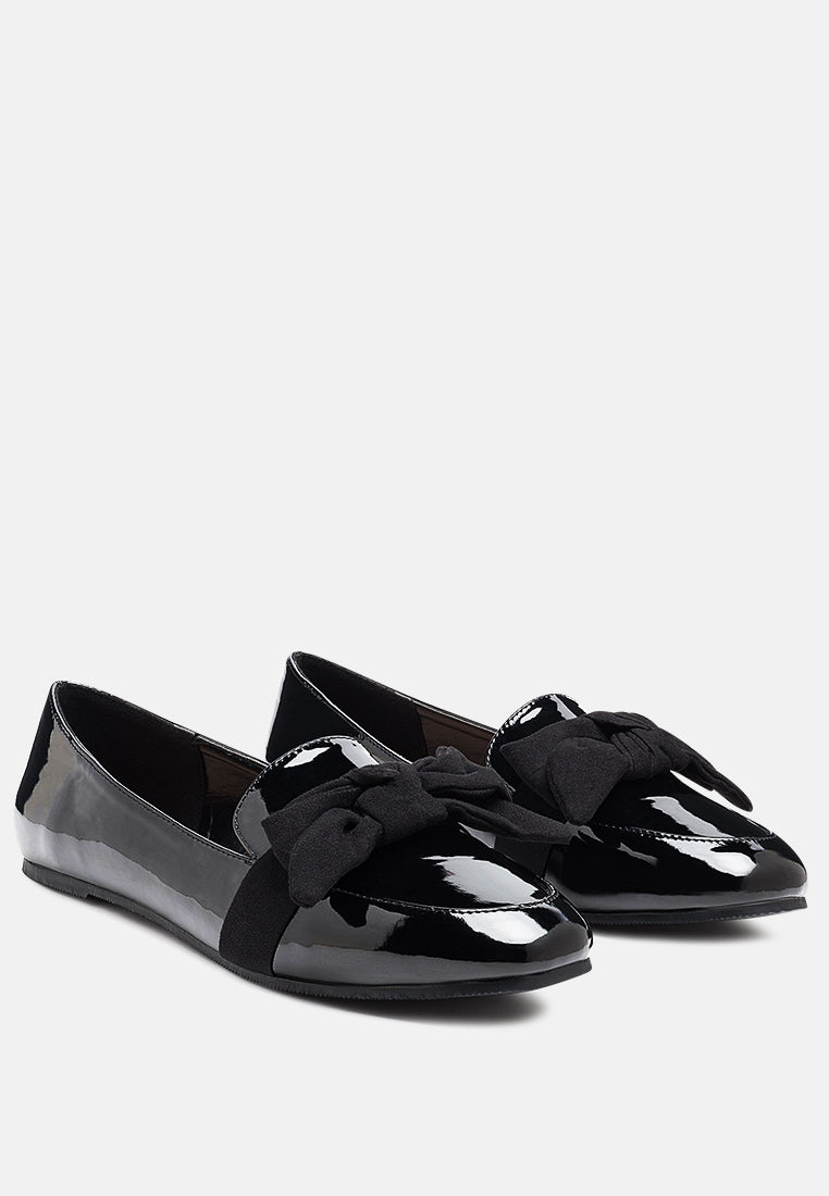 Black Pecan Pie Loafer pair with glossy finish and oversized fabric bow