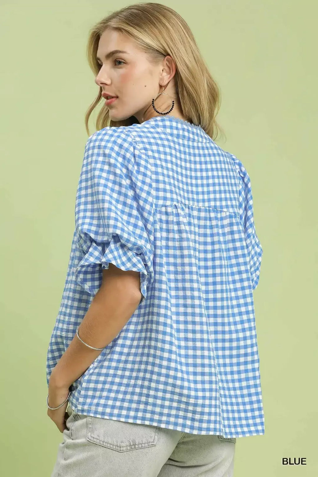 Blue gingham blouse back view with gathered yoke and ruffle hem on sleeves
