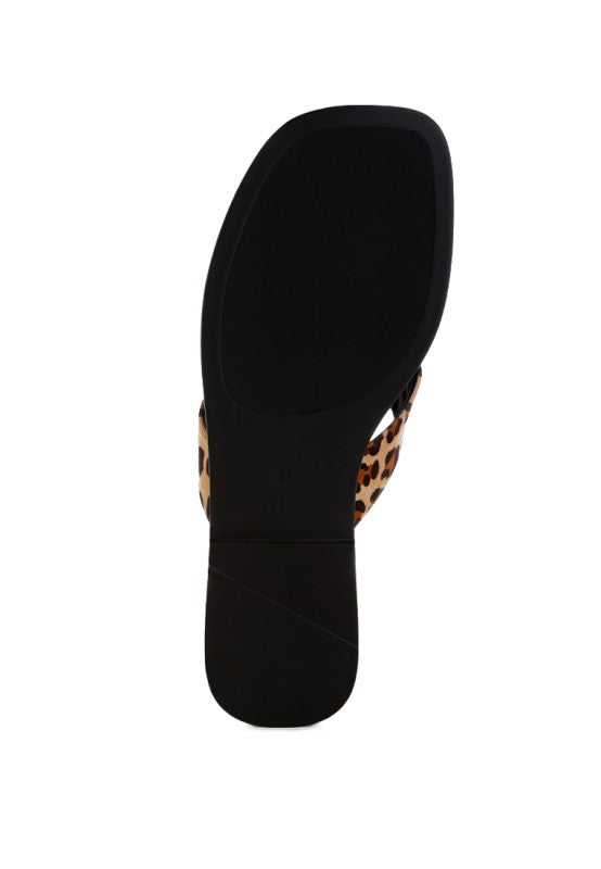 Thick black sole thong sandal with leopard print strap edge detail