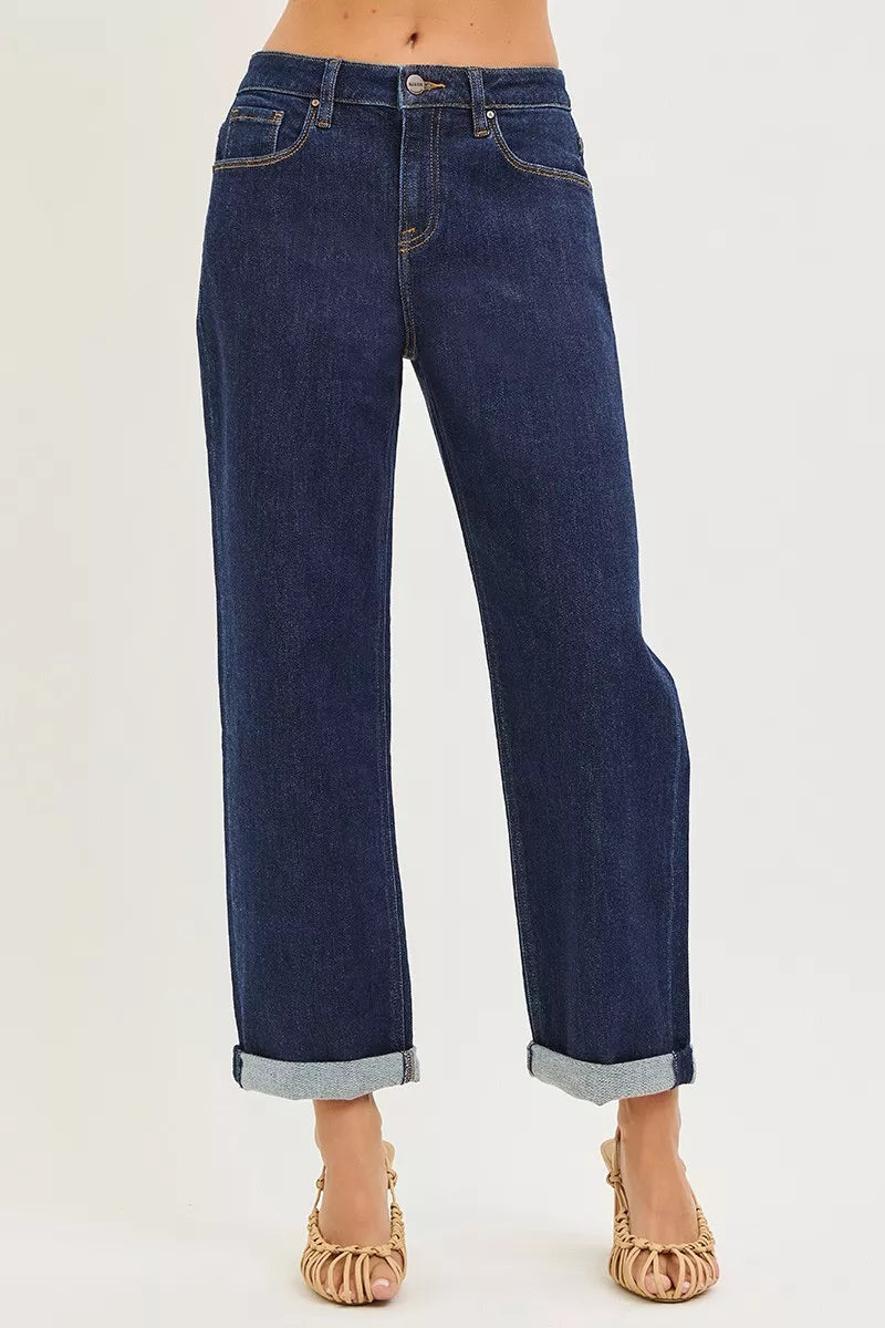 Slouchy cropped boyfriend jeans in dark blue with cuffed hem and front pockets.