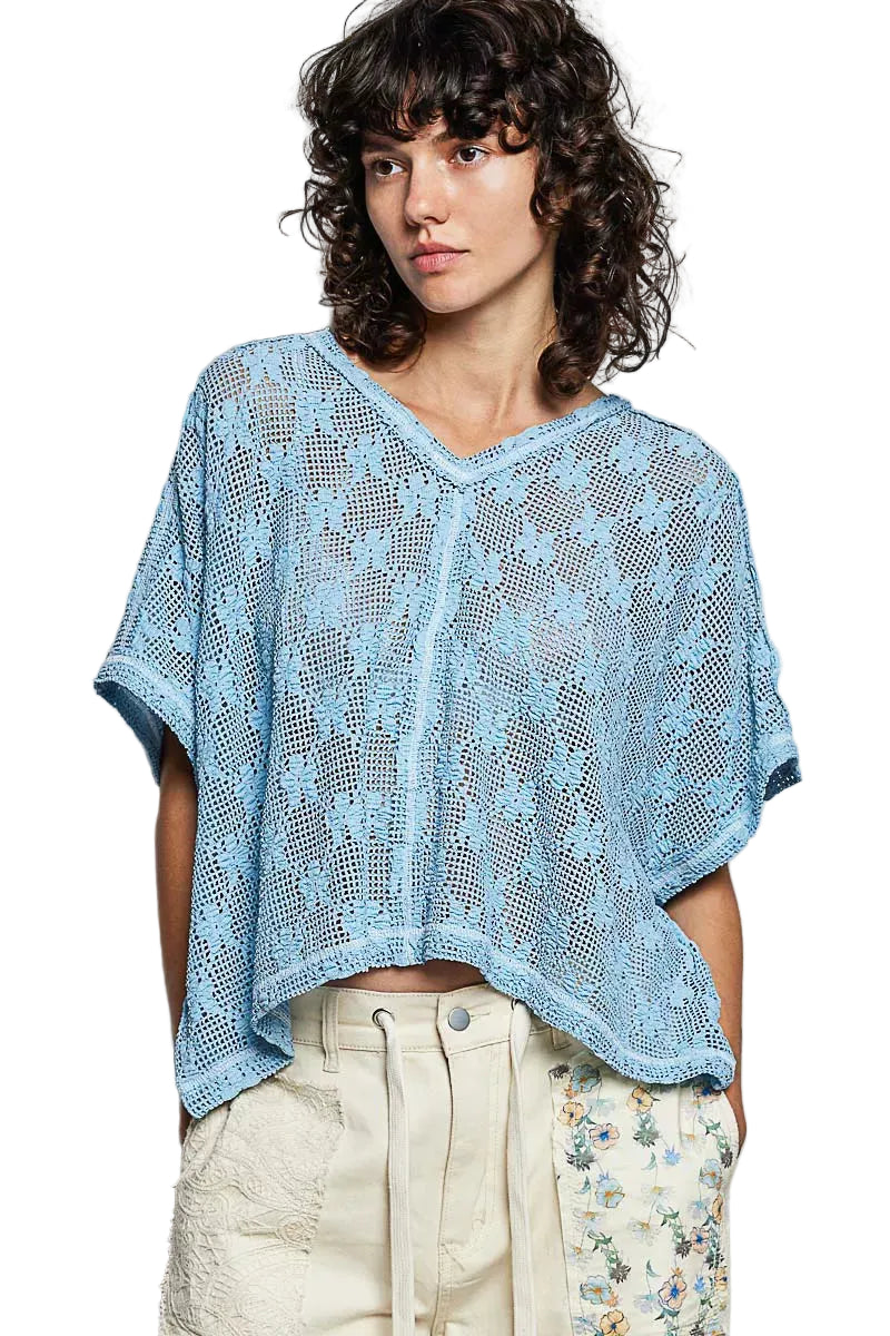 Blue crochet lace short sleeve top with V-neck and relaxed cropped fit
