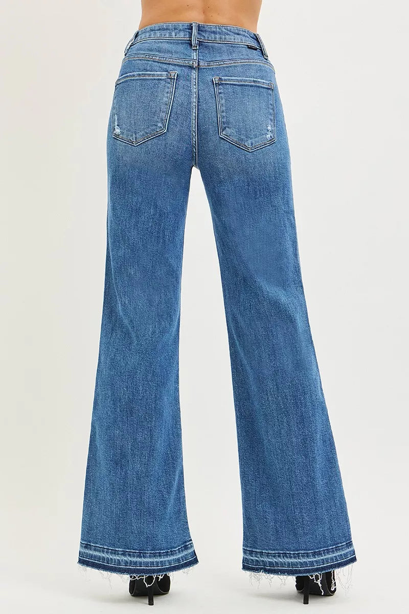 Back view: medium-blue high-rise wide-leg jeans with two rear pockets