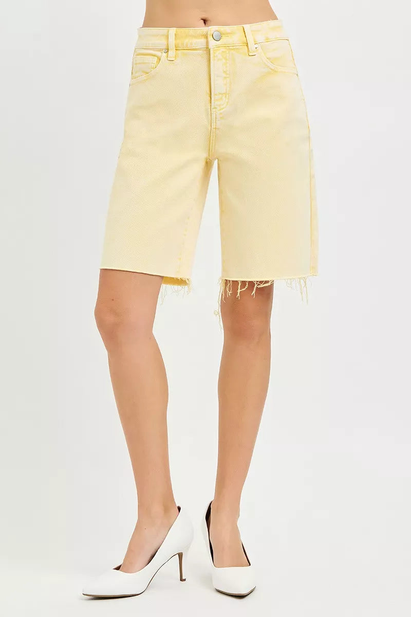 Banana yellow slouchy bermuda shorts, raw frayed hem, 5-pocket styling