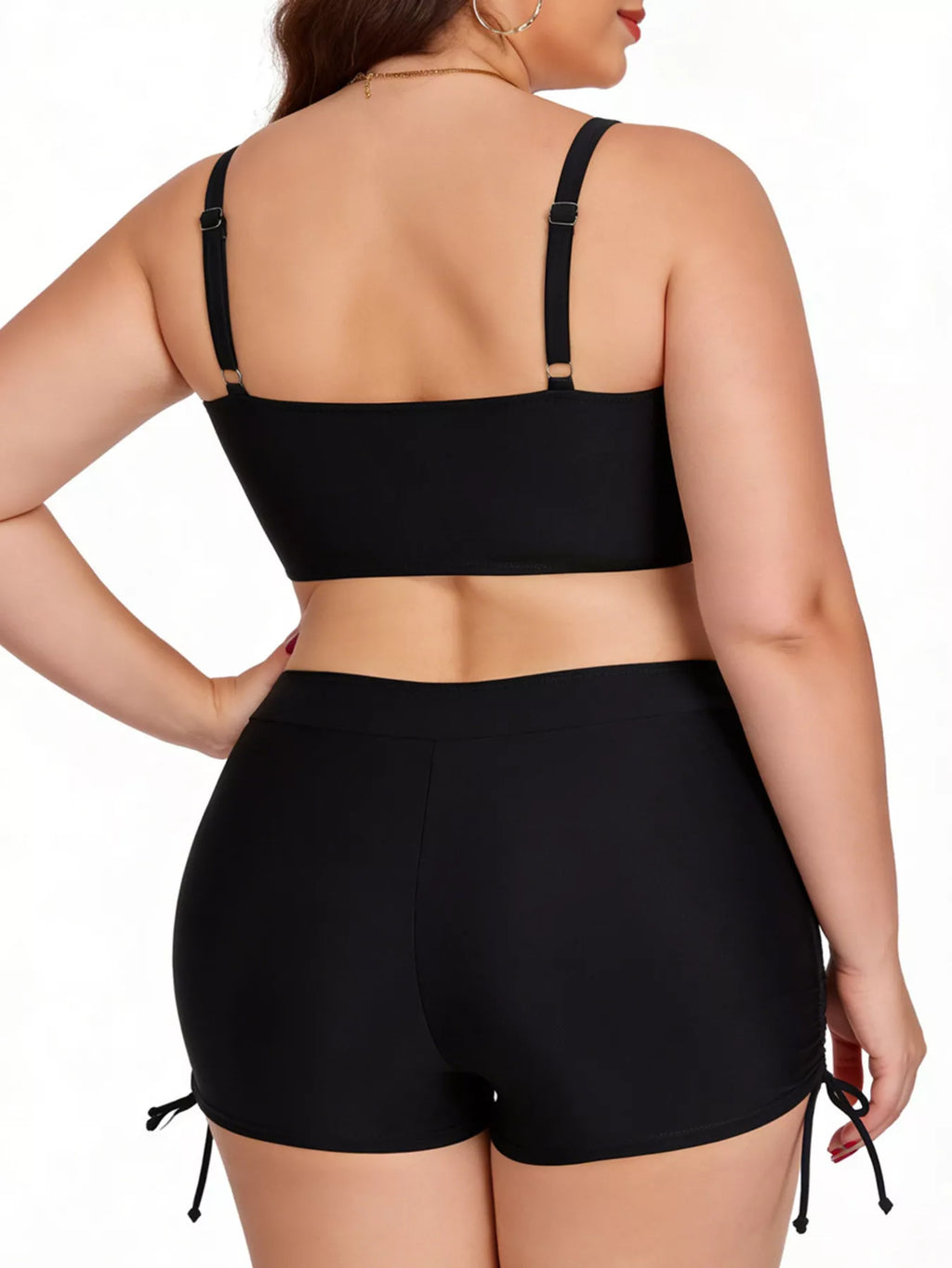 Back view of black plus size ruched swim set with adjustable shoulder straps