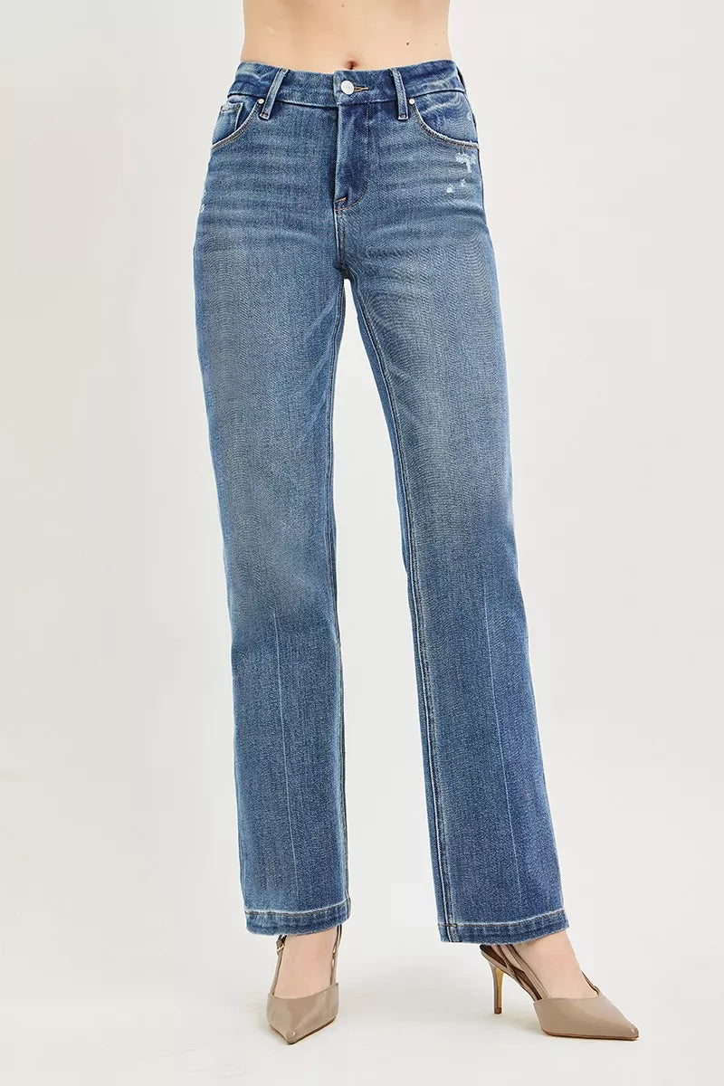 Medium-wash straight jeans from front, mid-rise waistband with belt loops and classic pockets
