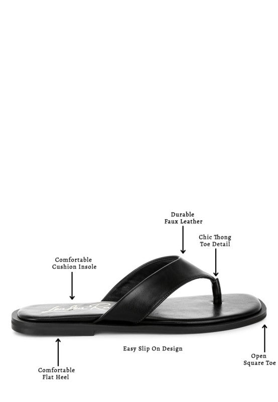 Black toe-post thong flats with open square toe, flat heel, and cushion insole