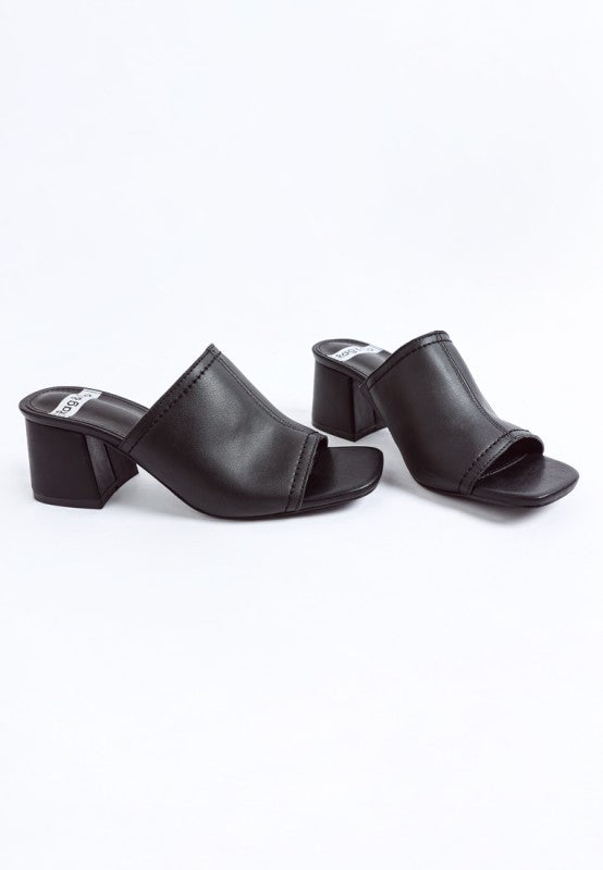 Black slip-on leather heels, open square toe, mid block heel, two shoes shown