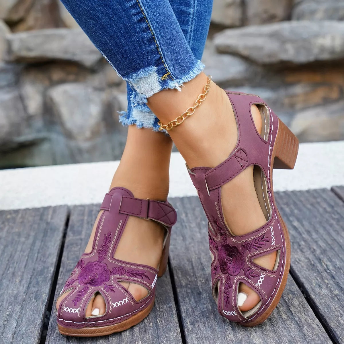 Purple cutout block heel sandals with ankle strap and open toe, floral stitching