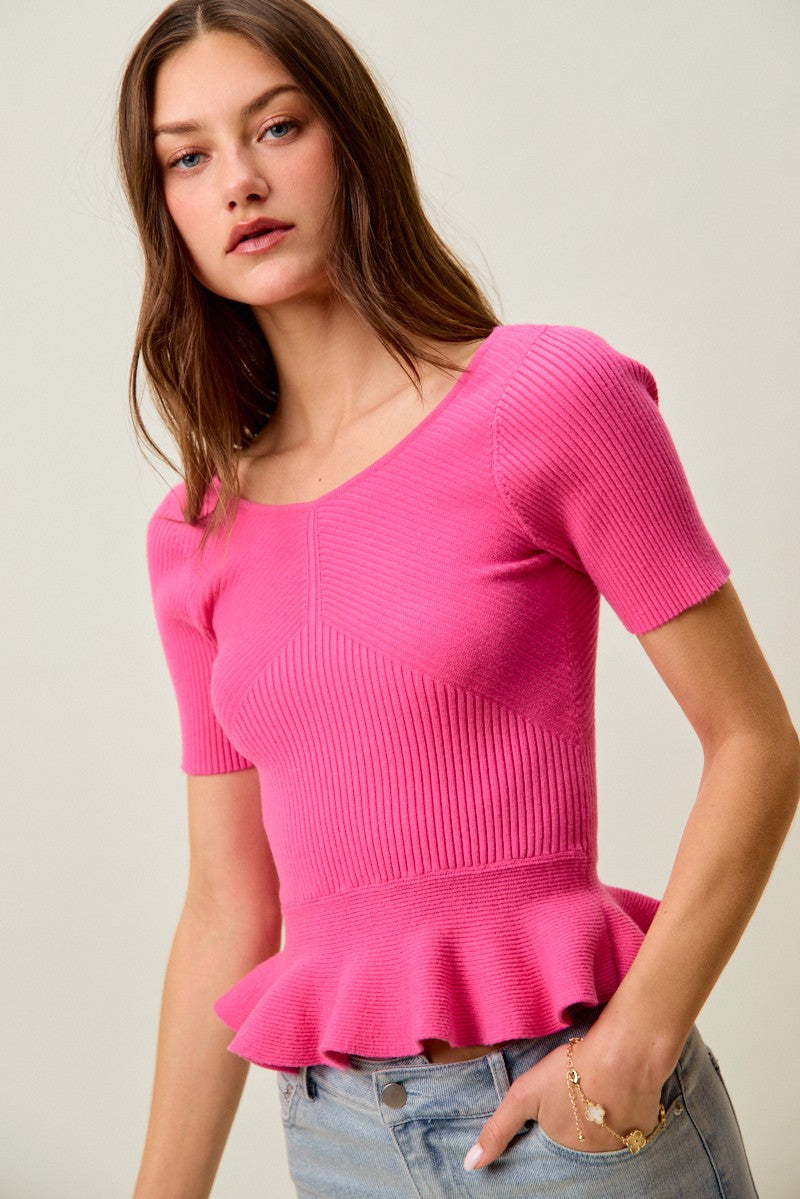 Hot pink ribbed knit peplum sweater top, short sleeves, flared peplum hem