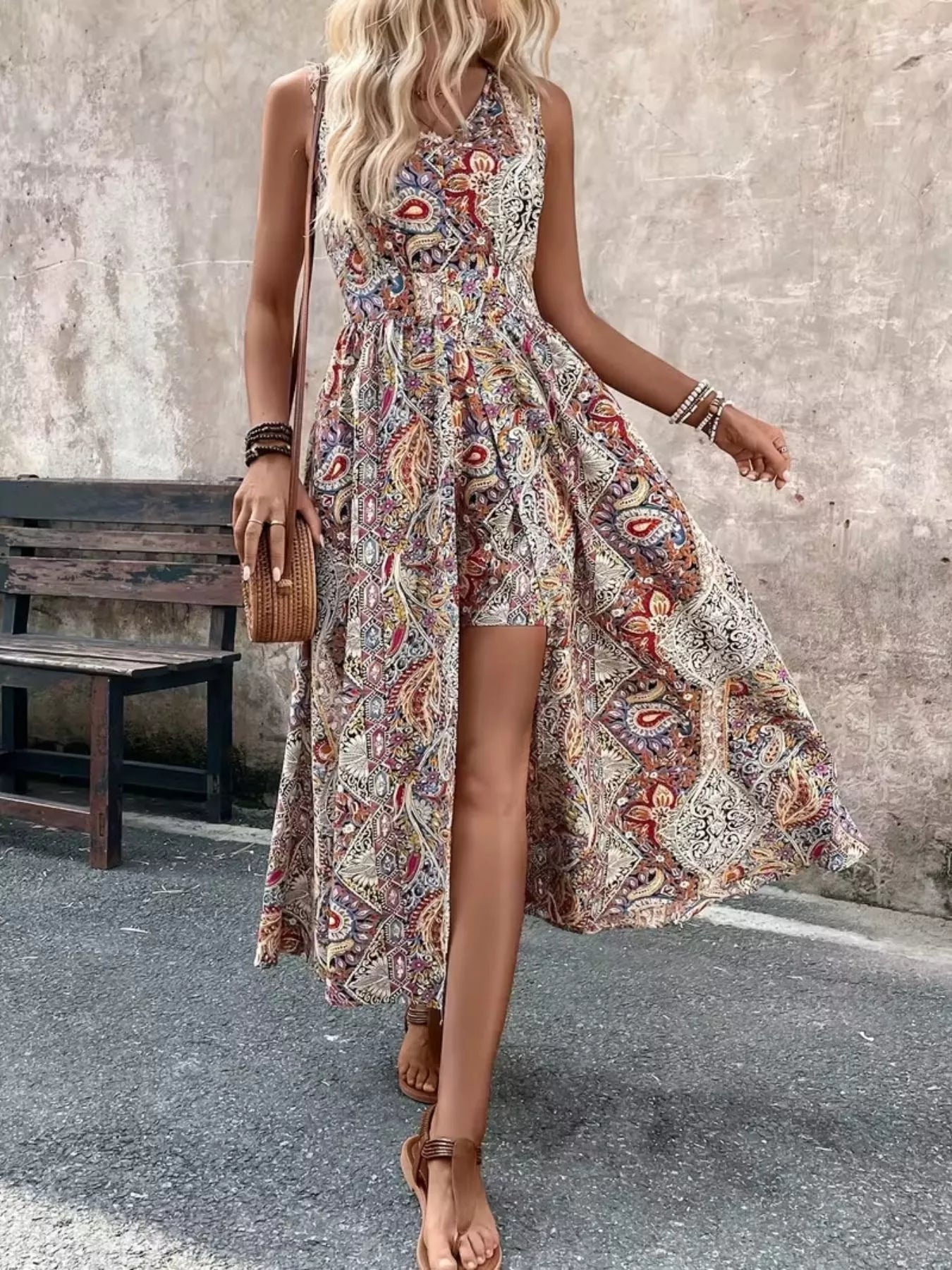 Paisley print sleeveless romper with long top, V-neck and side slit in tan/multicolor