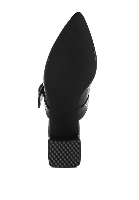 Black mule side profile with small buckle strap detail and block heel