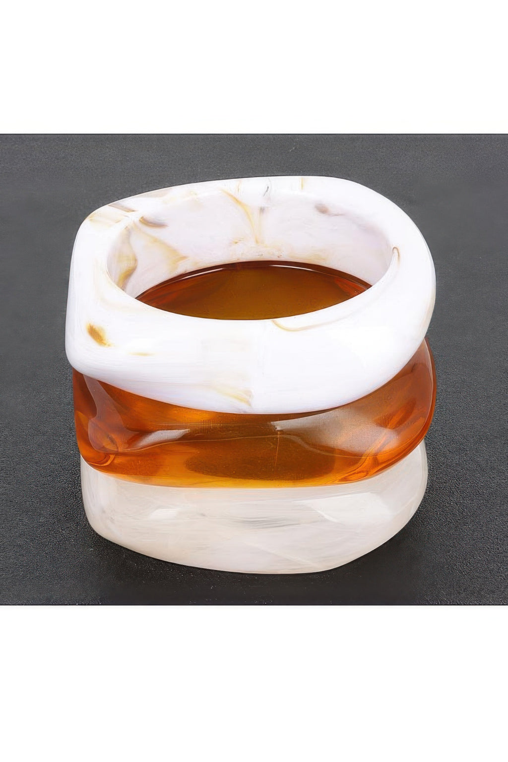 White resin bangle with warm marbled swirls, wide cuff style