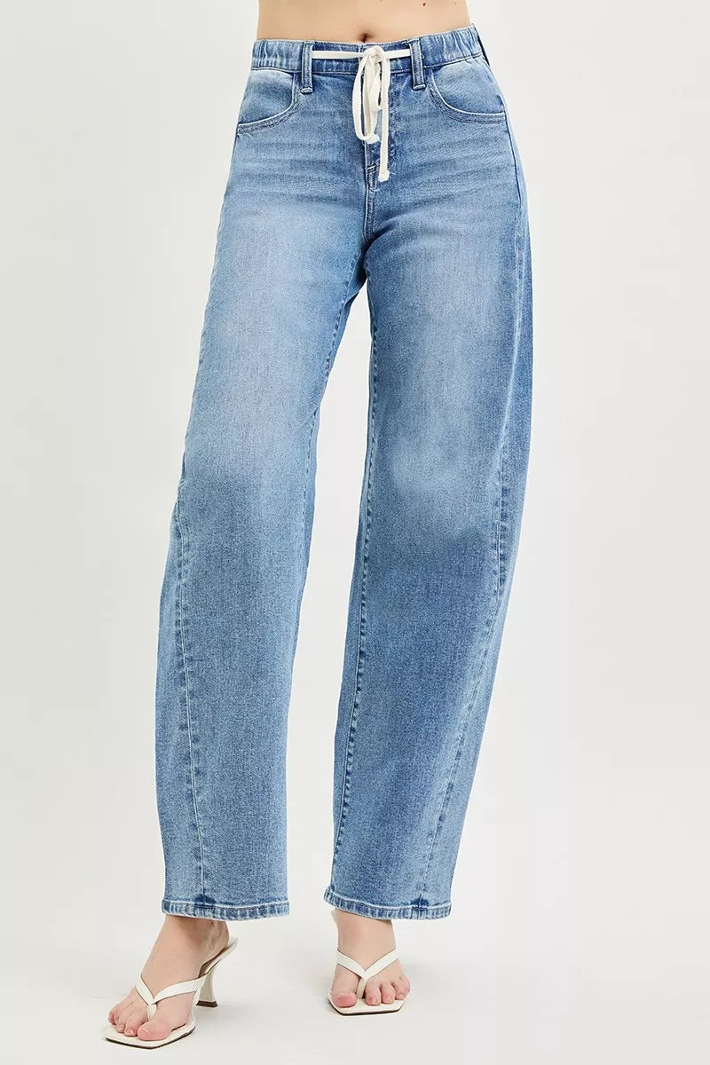 Light wash relaxed-fit jeans with drawstring elastic waist and wide leg shape