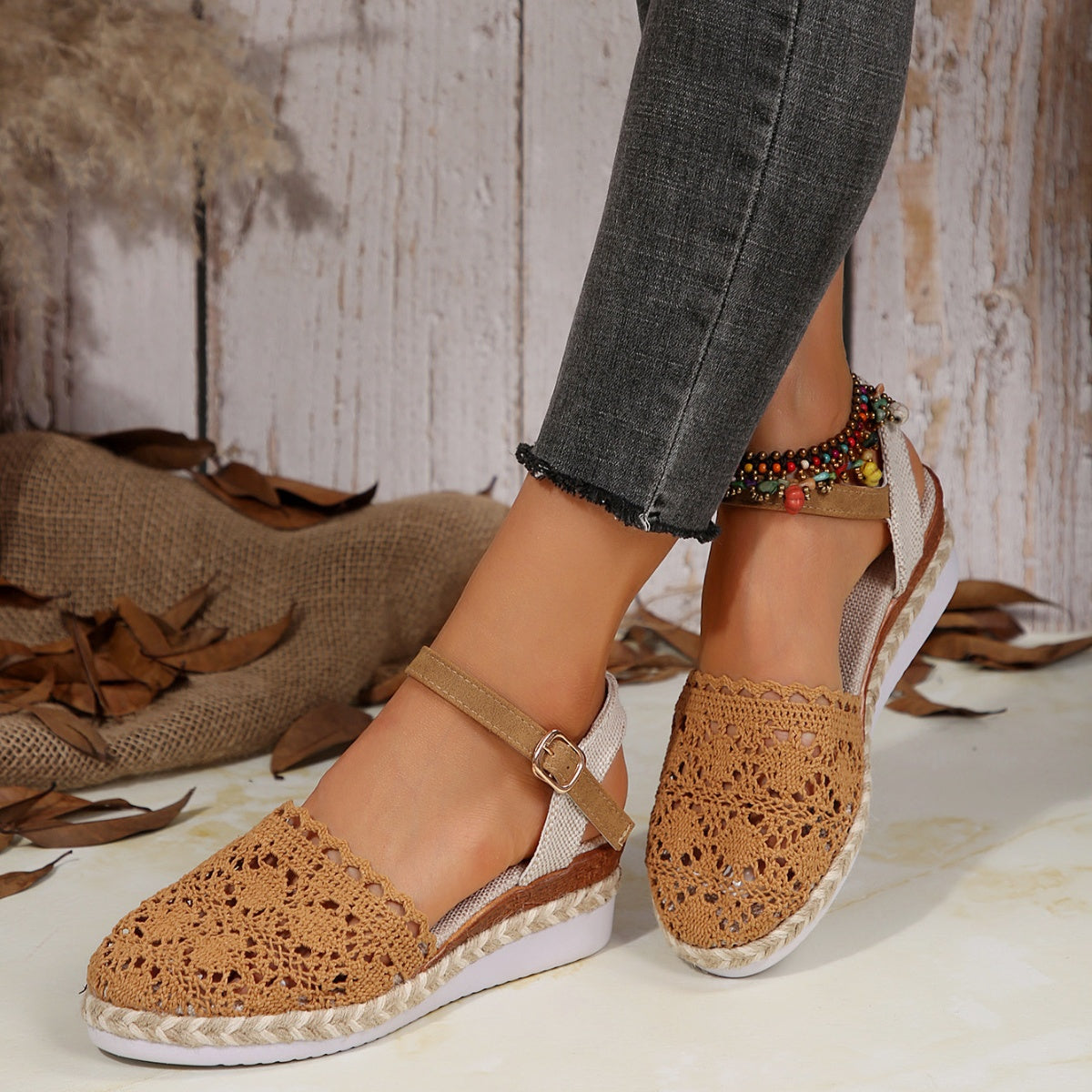 Brown ankle-strap espadrilles with woven jute trim and crochet upper