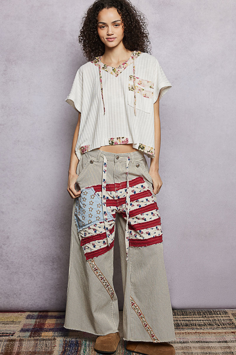 Off-white short-sleeve hooded top with floral paneling and front chest pocket