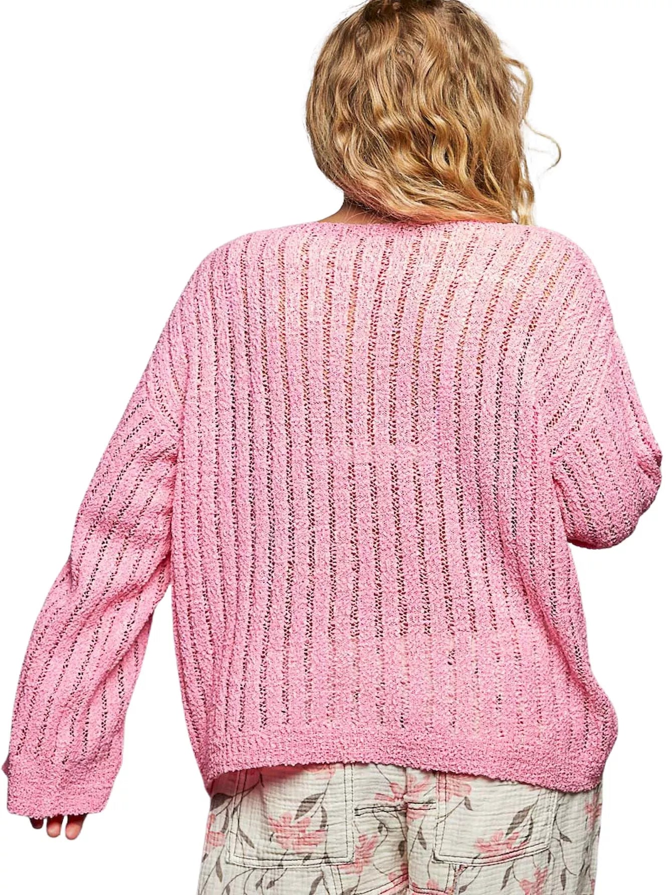 Pink open-knit coverup sweater with long sleeves, back view