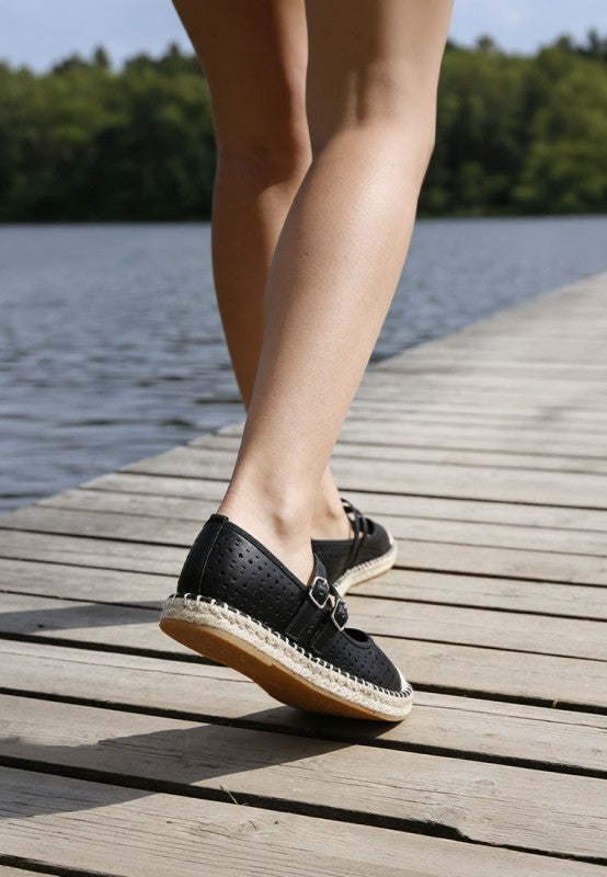 Black woven dual buckle sandals with perforated upper, adjustable pin buckles, espadrille sole