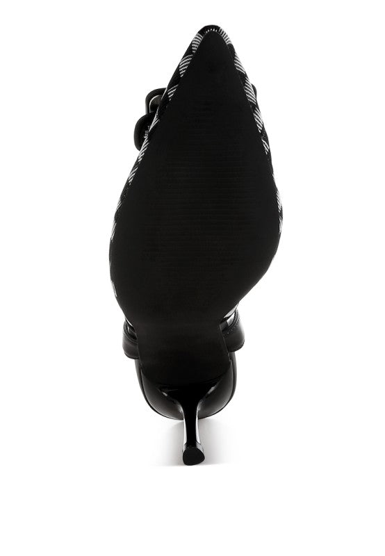 Heel and back of black stiletto slingback with checkered fabric panel at top