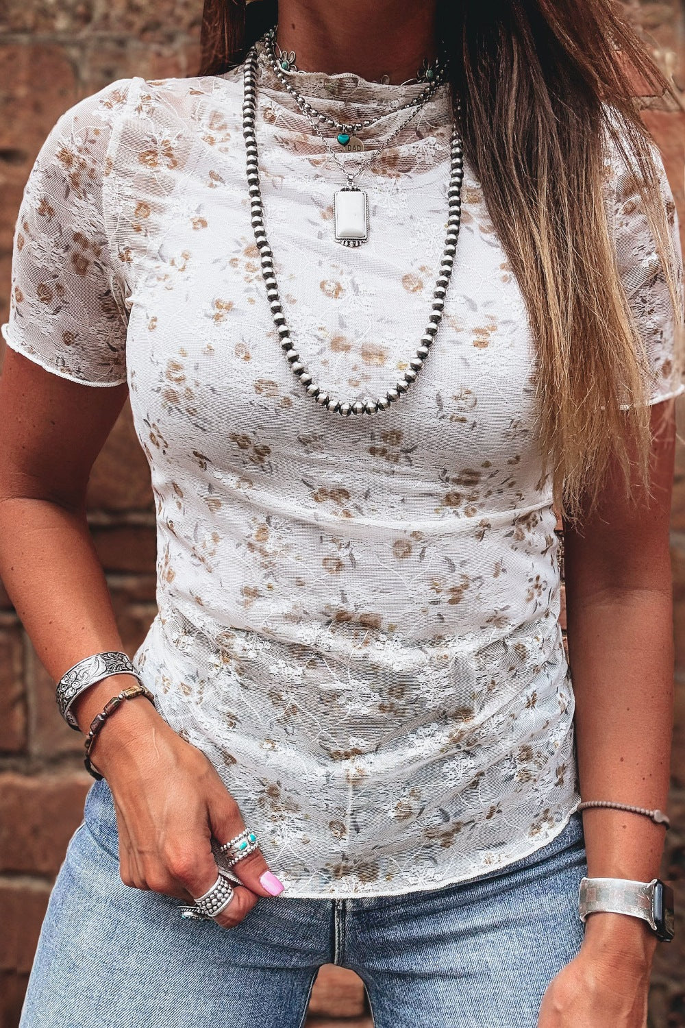 White floral lace mock-neck fitted T-shirt with short sleeves and gathered waist