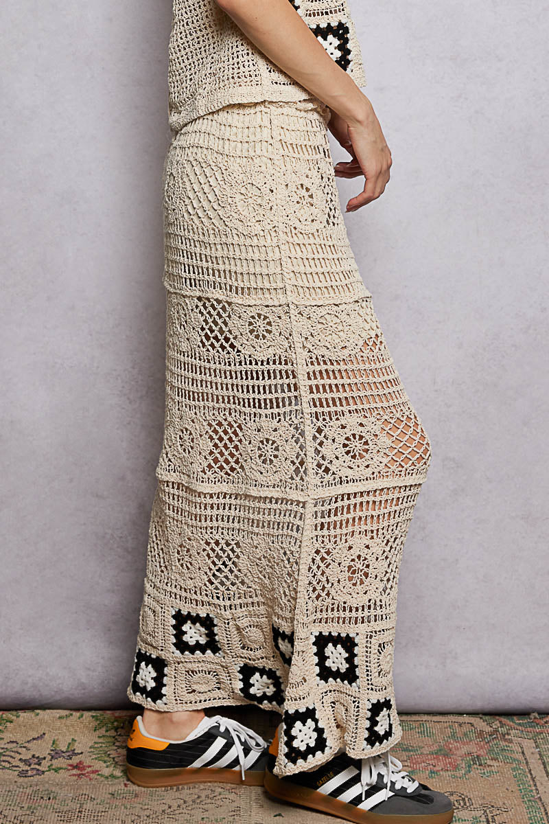 Natural crochet maxi skirt, lace-like stripes and granny square panels at the hem