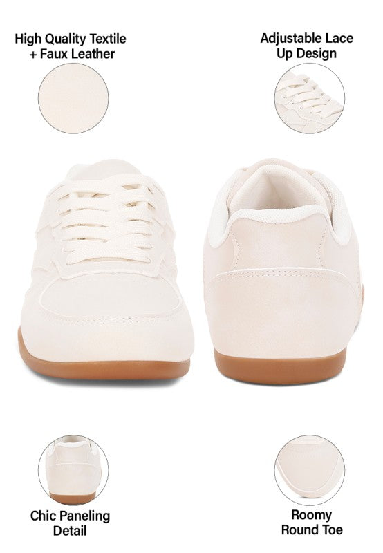 Ivory lace-up sneakers shown front and heel, rounded toe and cushioned collar
