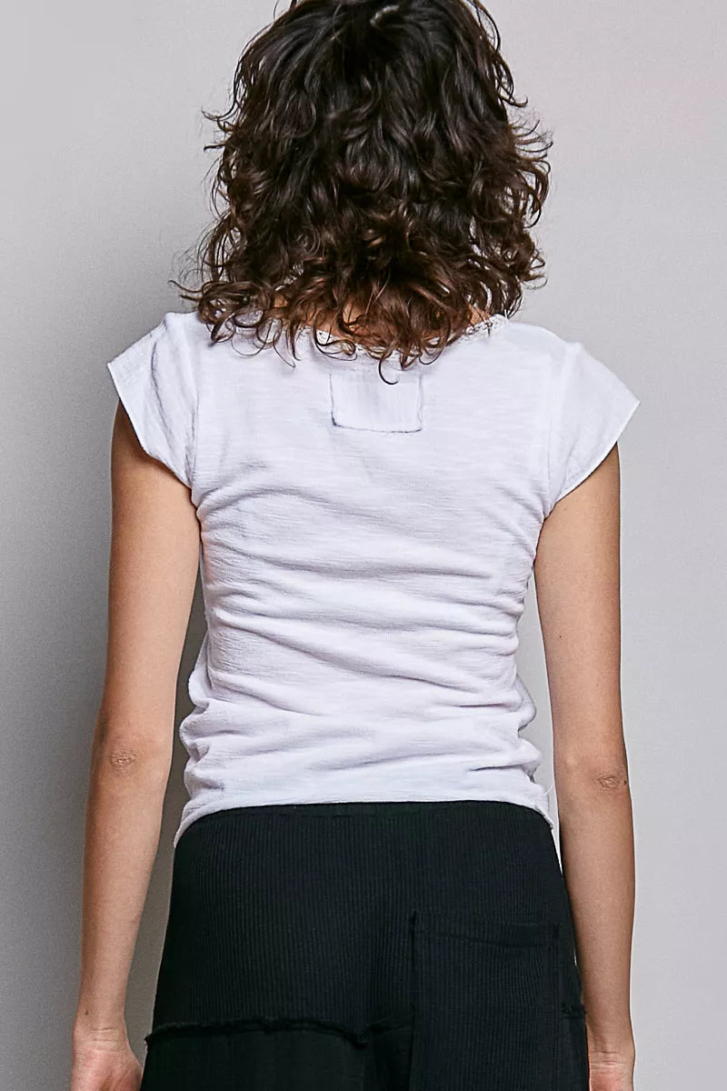 Off-white knit top with V-neck lace trim, back view
