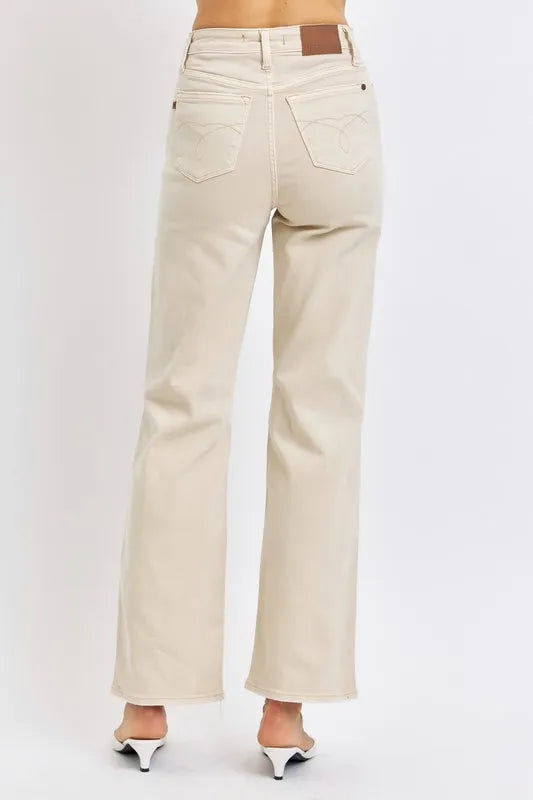 High-rise wide-leg jeans in bone wash with distressed knee detail