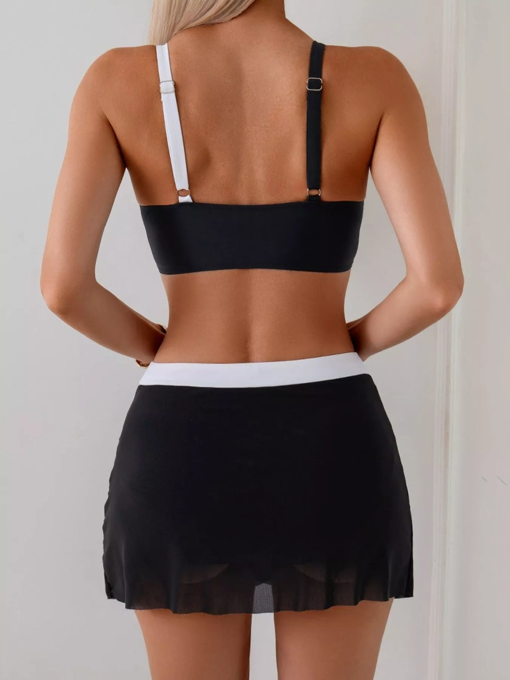 Two Tone Cami and Skort Swim Set back view: black skort with white waistband and straps
