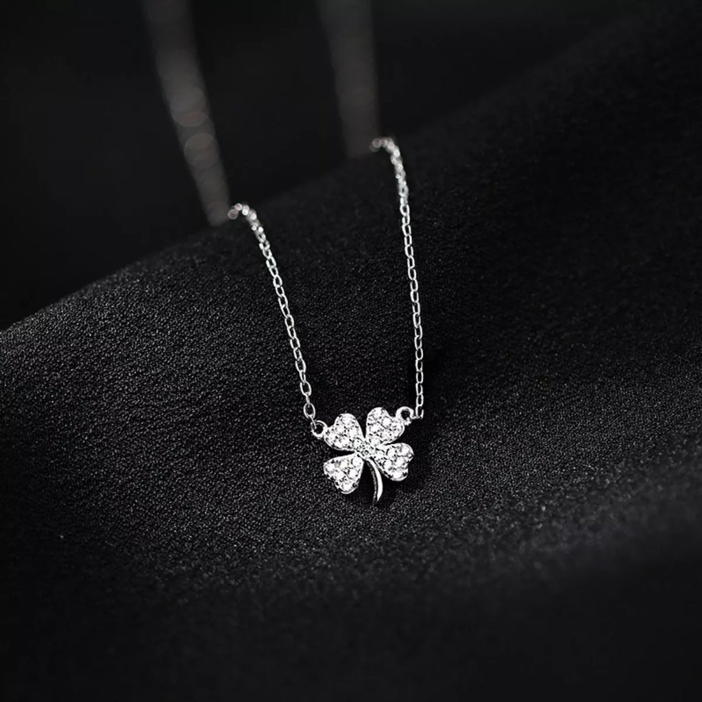 Sterling silver four-leaf clover necklace pendant with zircon accents on chain