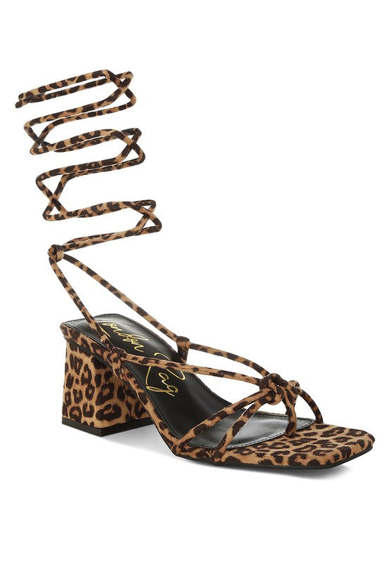 Leopard print square-toe heeled sandal with crisscross ankle straps and block heel