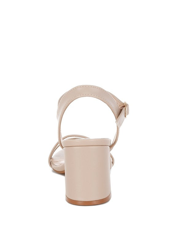 Beige back view of mesh block heel sandal with ankle strap and buckle