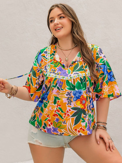 Plus Size Printed Tie Neck Half Sleeve Blouse - Tigbul's Variety Fashion Shop