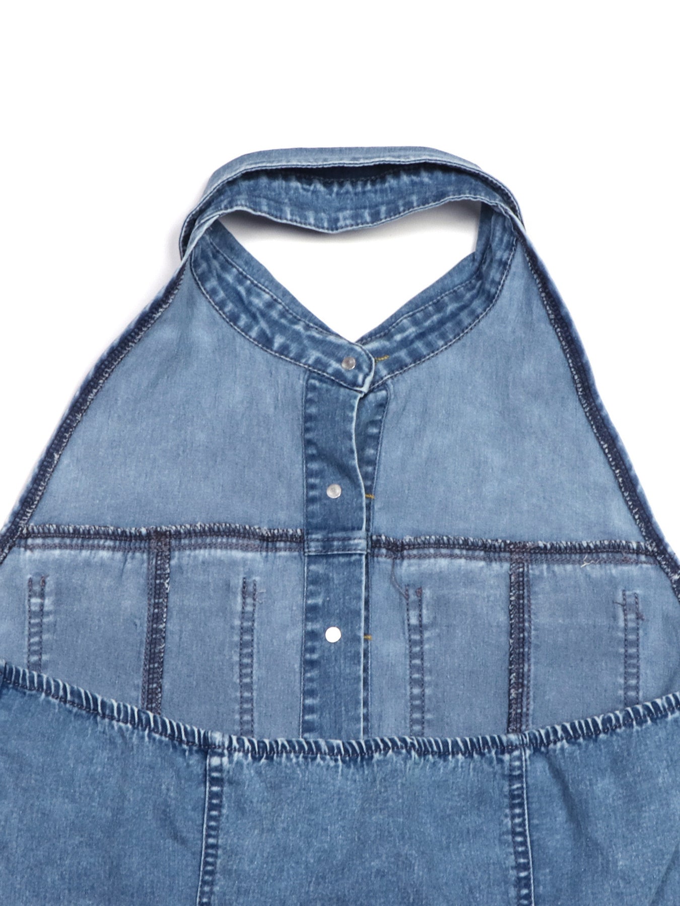 Back neck view: halter neckline and seam detailing on light blue denim dress