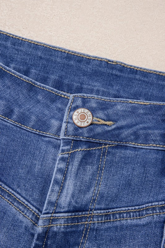 Beau Blue jeans close-up: waistband button and logo patch, belt loops