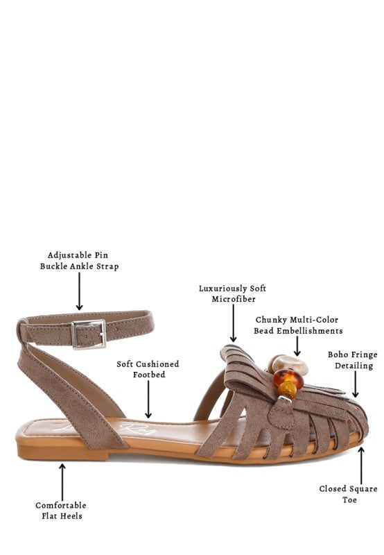 Taupe suede-like flats with adjustable pin buckle ankle strap, closed square toe, beads