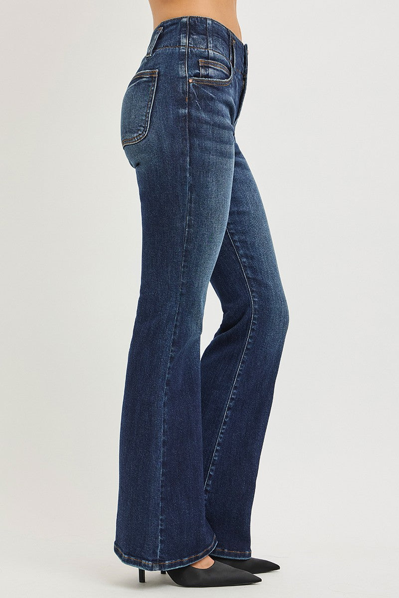 High-rise flare jeans, dark wash denim, side view with stitched seams and wide hem