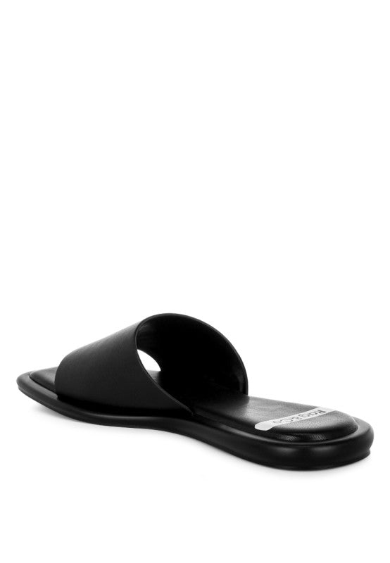Black square-toe flat slide sandals, open toe and smooth strap upper