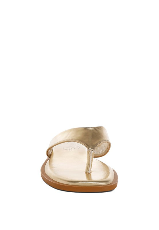Gold metallic thong flats, front view, square toe and flat sole