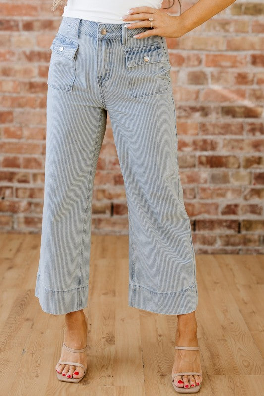 Wide leg jeans, sky blue stripe wash, front button closure and belt loops in view