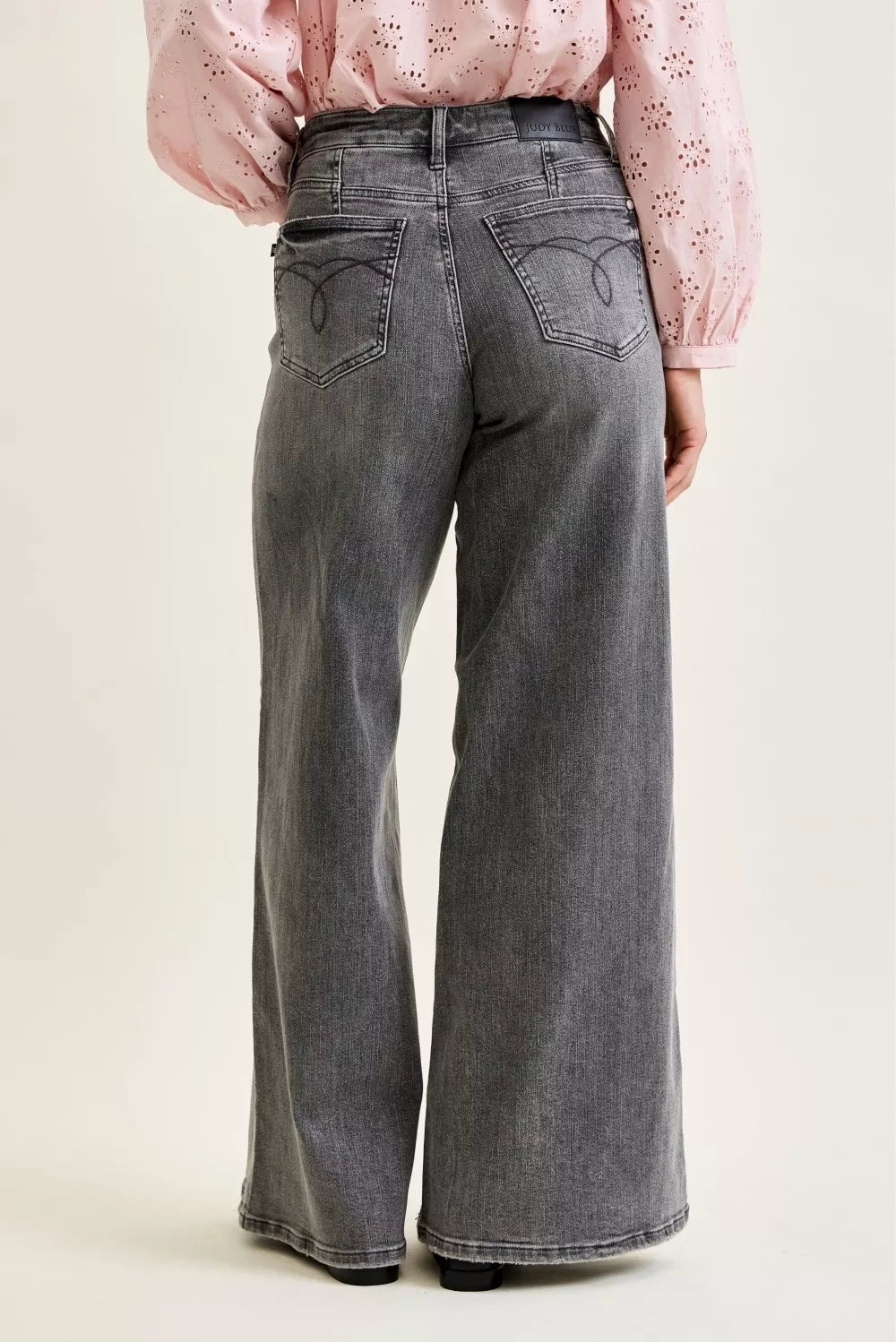Gray mid-rise palazzo jeans, back panel with yoke seam and two back pockets