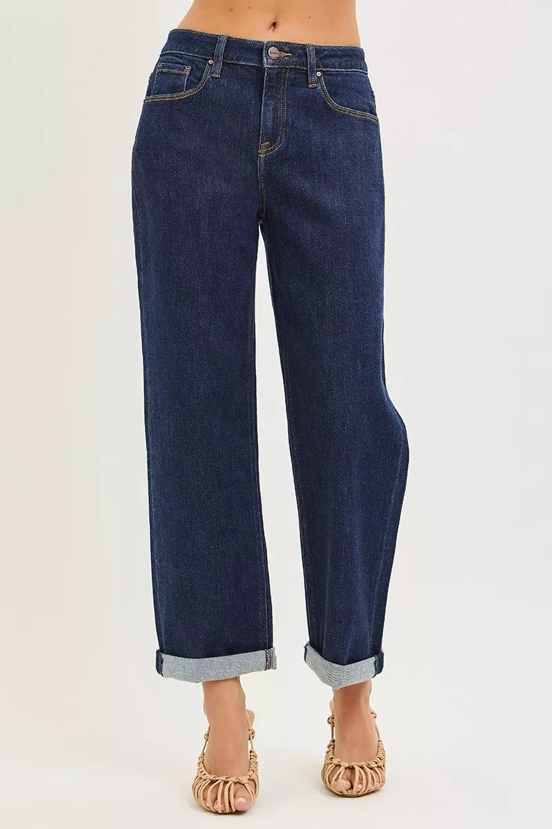 Dark blue slouchy cropped boyfriend jeans with back pockets and cuffed hem.