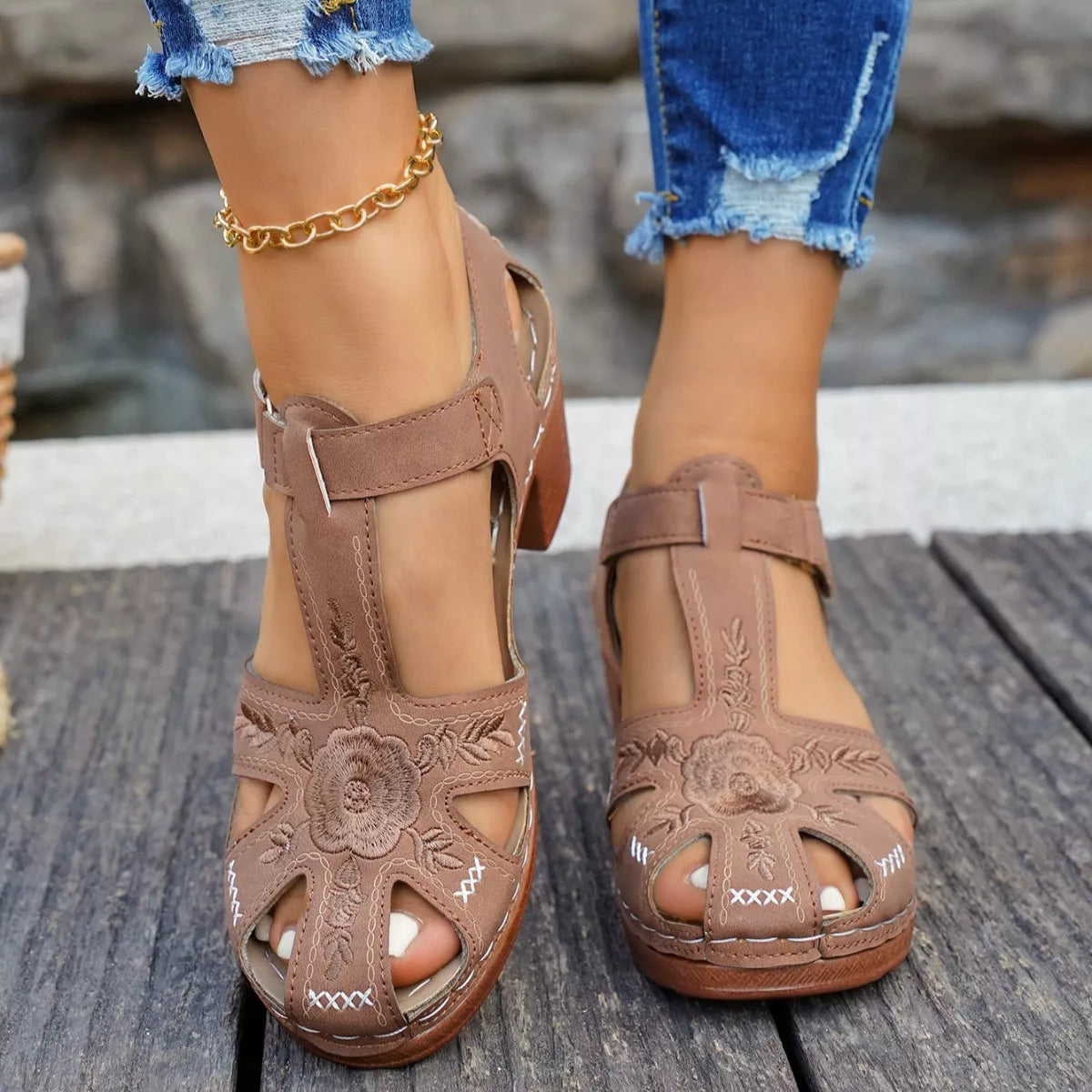 Tan cutout block heel sandals, open toe with crisscross straps and floral stitching