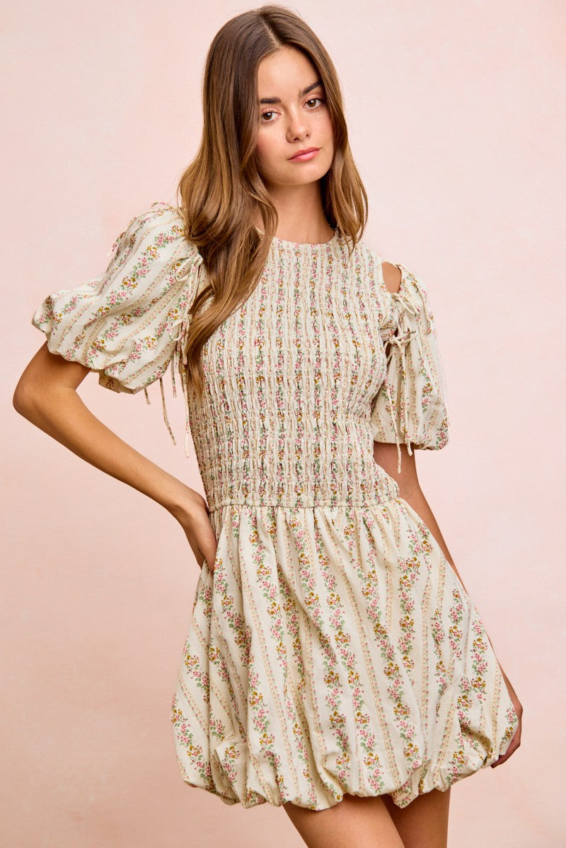 Ivory floral mini dress with puff sleeves and bow-tie shoulder ties