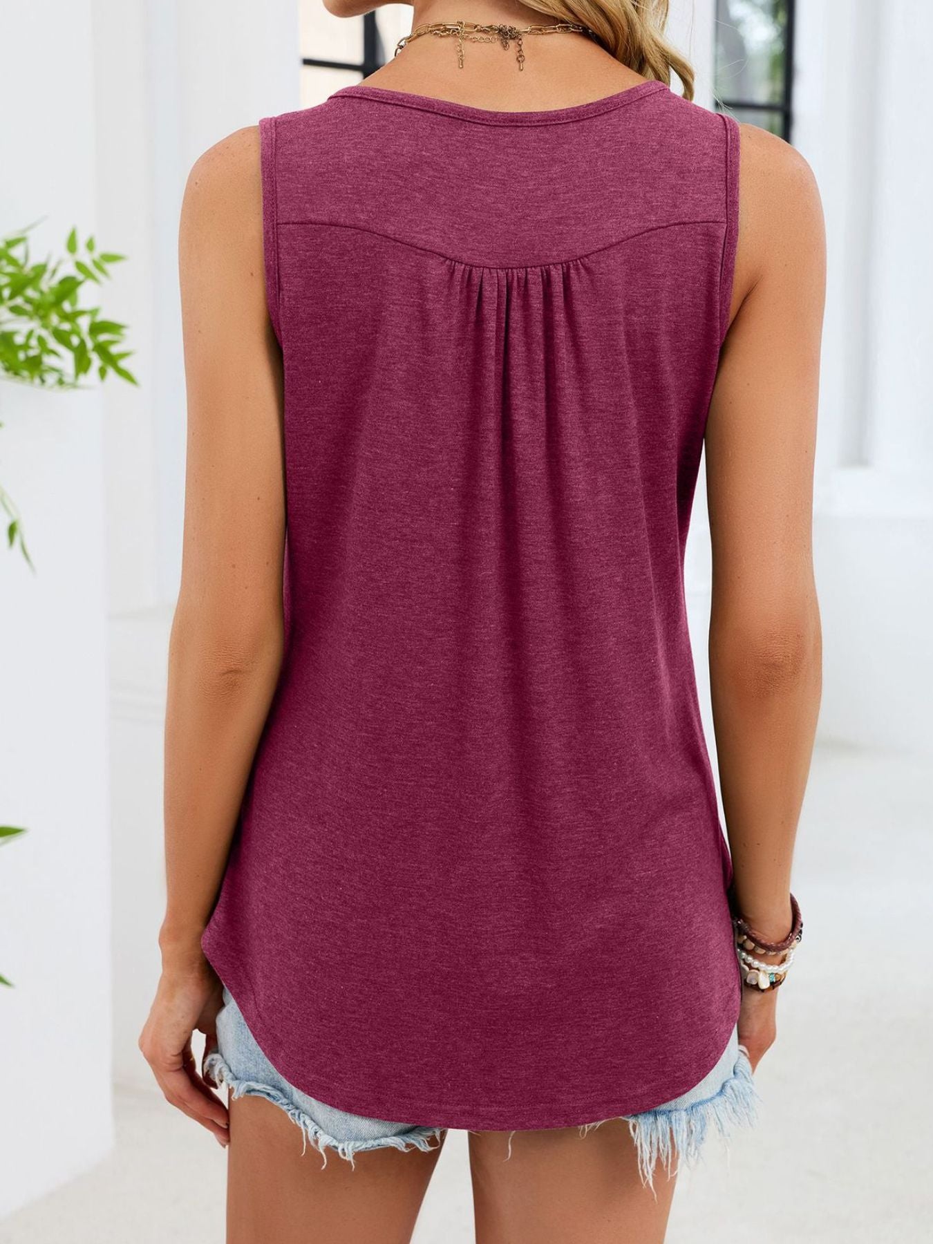 Back view: wine red round neck button detail tank with pleated yoke