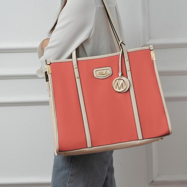 Coral MKF Kindred tote with cream trim, front logo patch, top handles, side zipper pocket