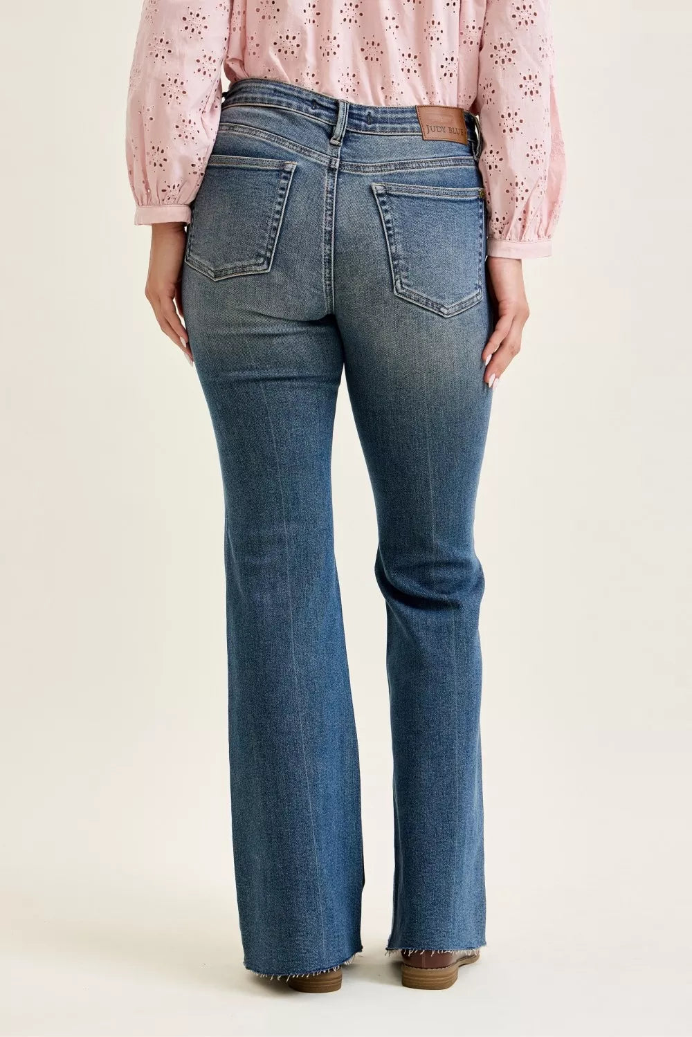 Mid-rise flare jeans, dark wash, back patch pockets and front flap pockets