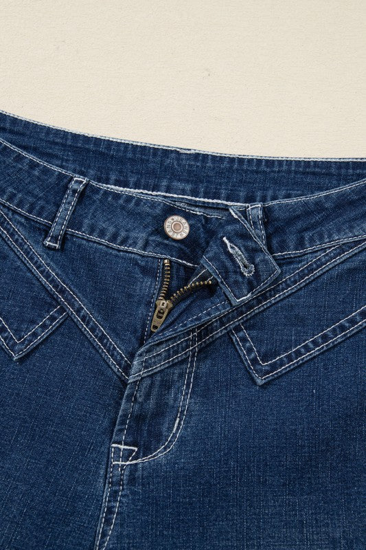 Front fly and waistband with button closure and double-stitched seams
