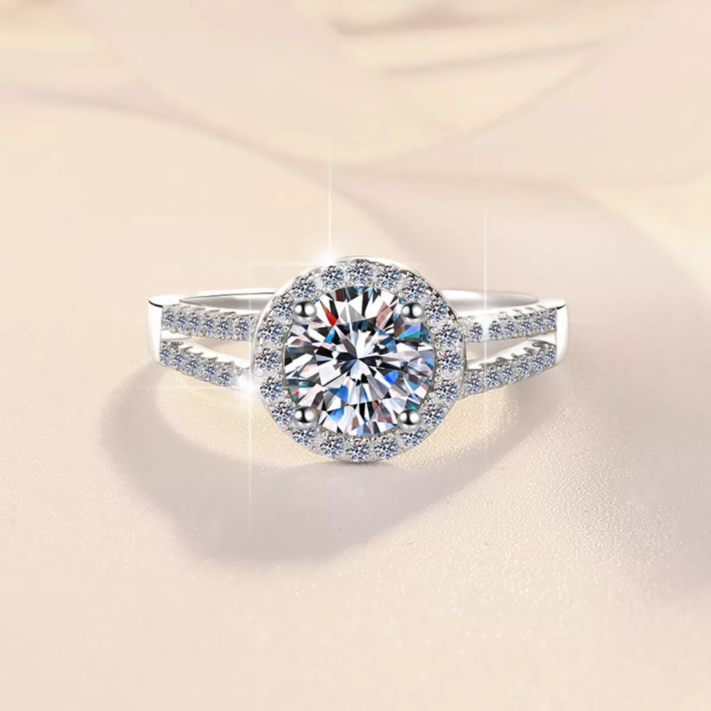 925 silver moissanite halo ring with round center stone and straight pavé side band